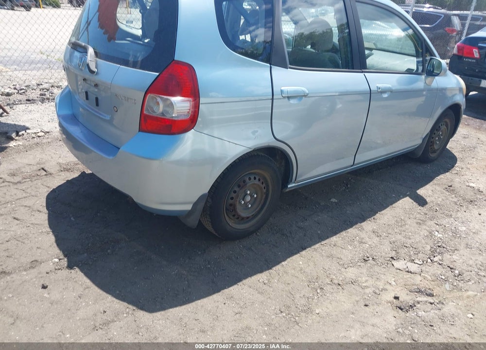 2007 HONDA FIT VIN: JHMGD38487S058706