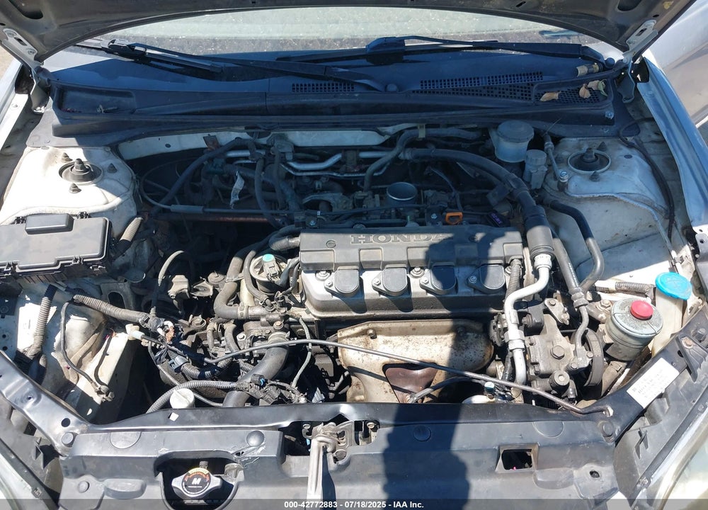 2004 HONDA CIVIC VIN: 1HGEM21144L058423