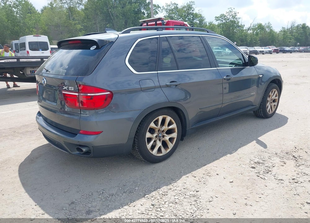 2013 BMW X5 XDRIVE35I/XDRIVE35I PREMIUM/XDRIVE35I SPORT ACTIVITY VIN: 5UXZV4C54D0E09424