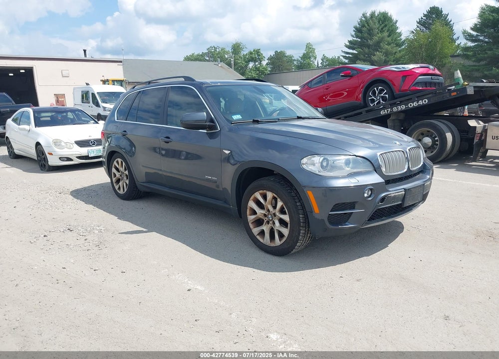 2013 BMW X5 XDRIVE35I/XDRIVE35I PREMIUM/XDRIVE35I SPORT ACTIVITY VIN: 5UXZV4C54D0E09424