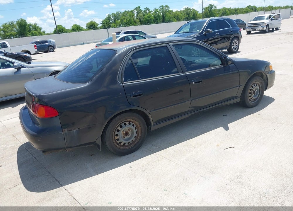 2001 TOYOTA COROLLA VIN: 2T1BR12E11C424811