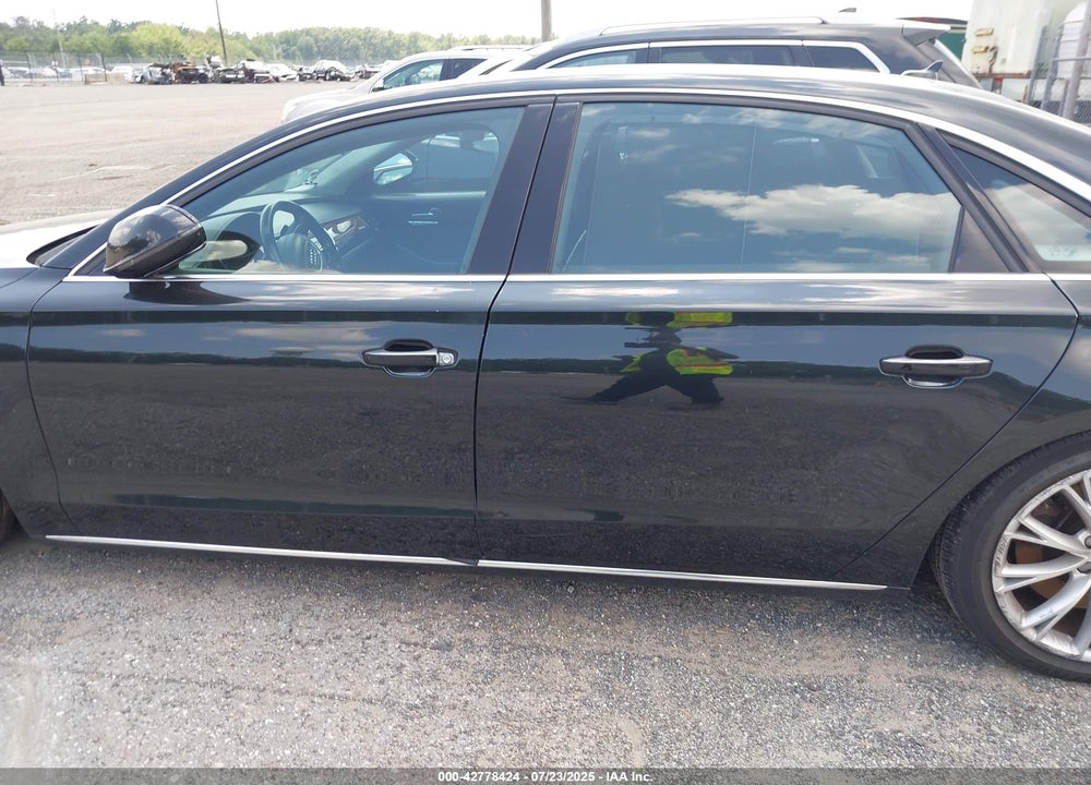 2012 AUDI A8 L VIN: WAURVAFD2CN002071