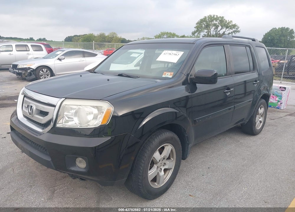 2011 HONDA PILOT VIN: 5FNYF4H61BB106351