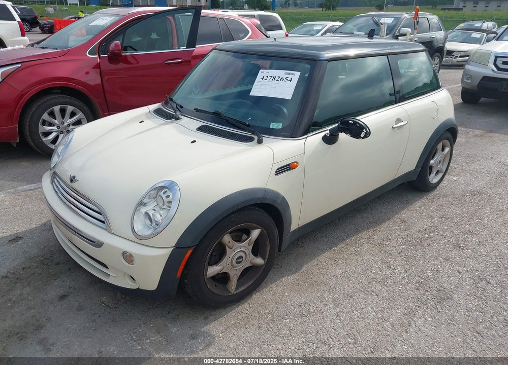 2006 MINI COOPER VIN: WMWRC33566TK73763