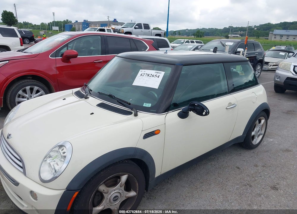 2006 MINI COOPER VIN: WMWRC33566TK73763