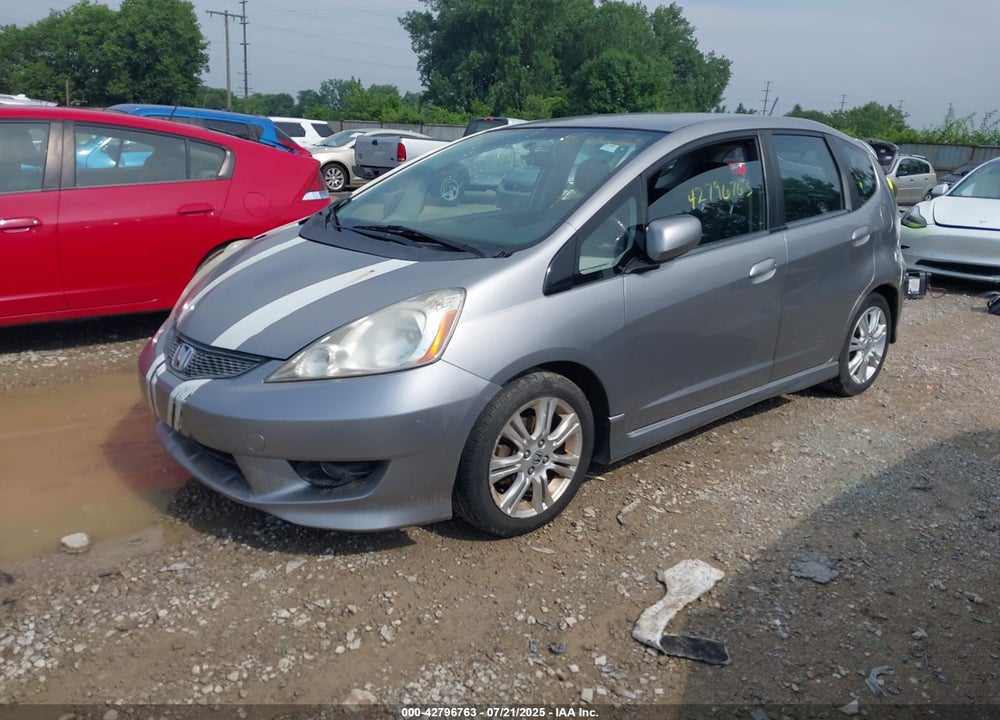 2009 HONDA FIT VIN: JHMGE88449S048297