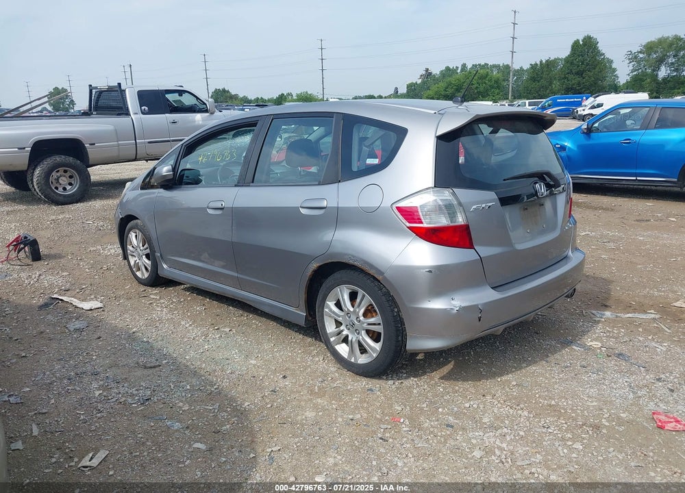 2009 HONDA FIT VIN: JHMGE88449S048297
