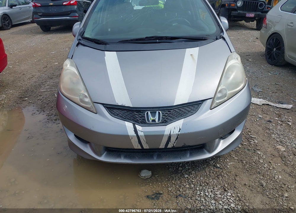 2009 HONDA FIT VIN: JHMGE88449S048297