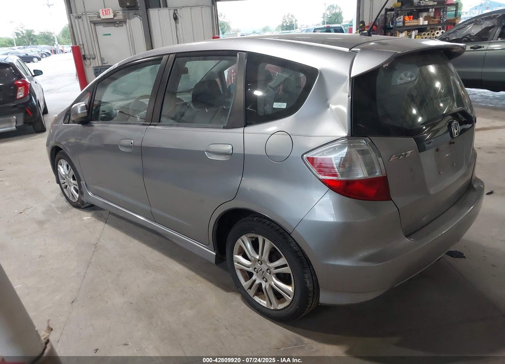 2009 HONDA FIT VIN: JHMGE88409S010324
