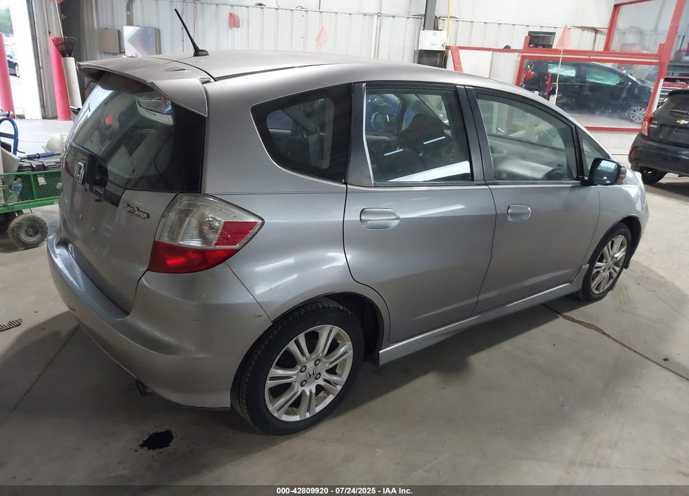 2009 HONDA FIT VIN: JHMGE88409S010324