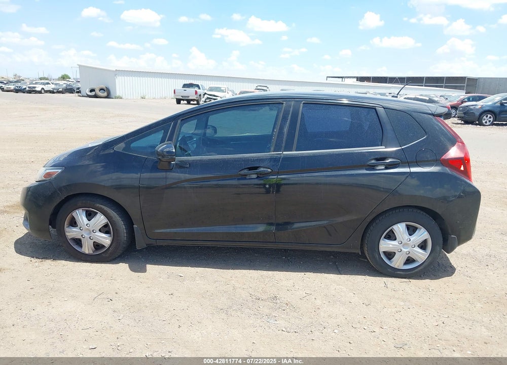 2015 HONDA FIT VIN: 3HGGK5H5XFM757095