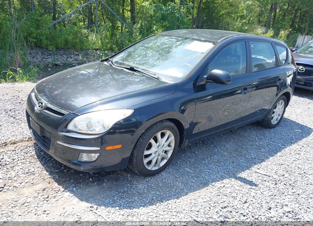 2009 HYUNDAI ELANTRA TOURING VIN: KMHDC86E09U045550