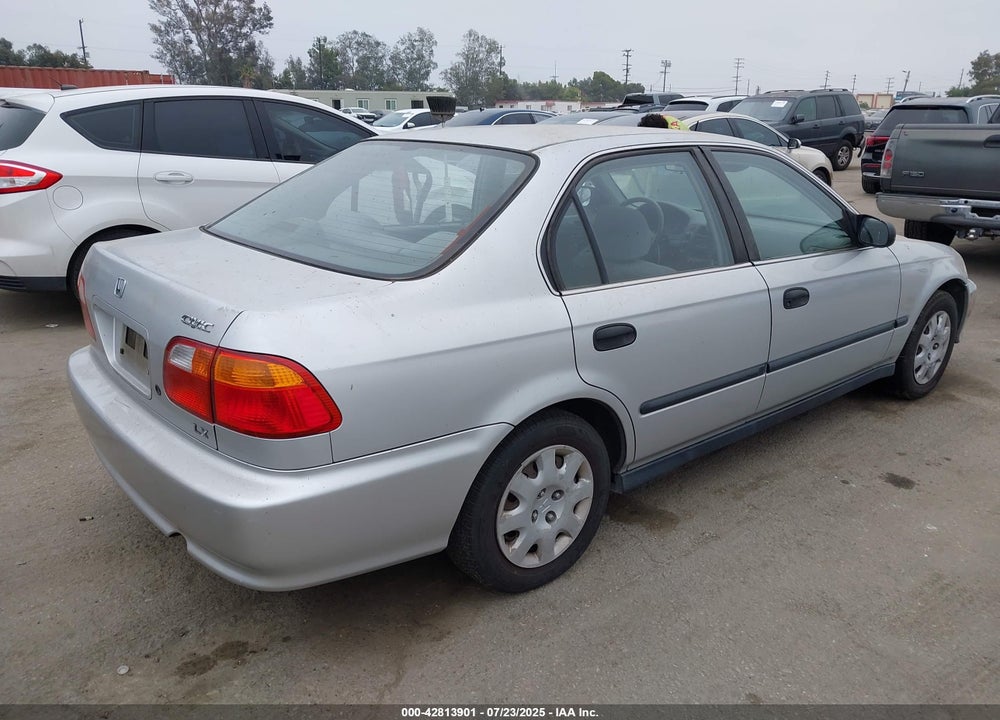 1999 HONDA CIVIC LX VIN: JHMEJ6674XS003474