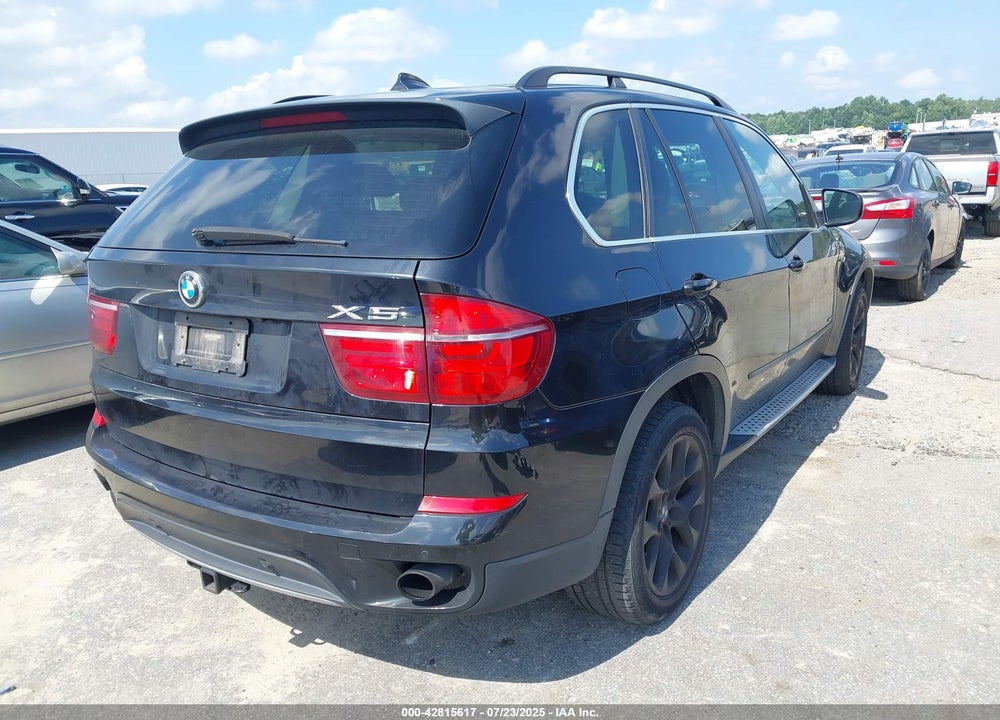 2013 BMW X5 VIN: 5UXZV4C5XD0E09010