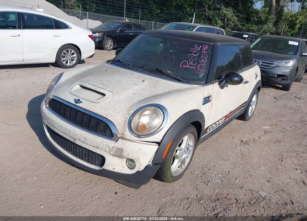 2007 MINI COOPER S VIN: WMWMF73567TL88079