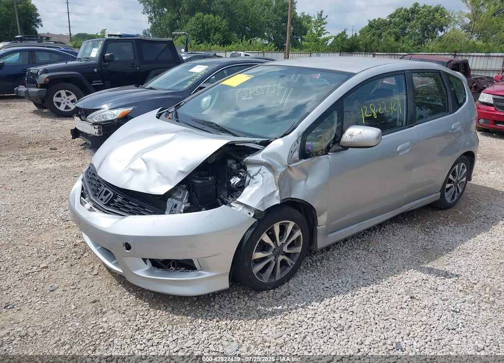 2012 HONDA FIT VIN: JHMGE8H59CC011661