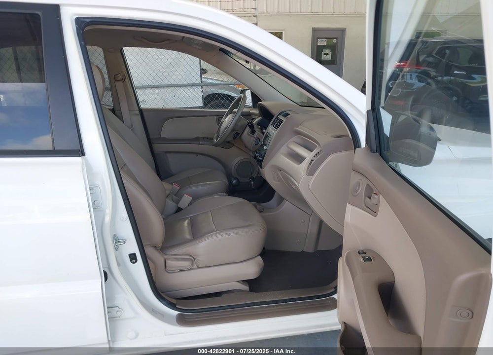 2009 KIA SPORTAGE VIN: KNDJF724497563214
