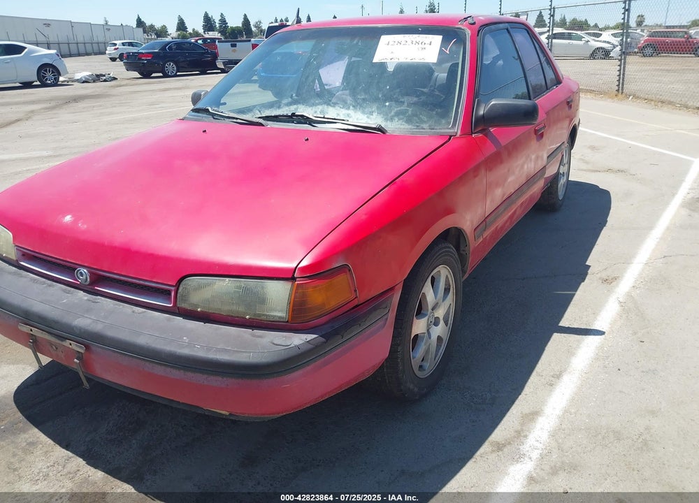 1994 MAZDA PROTEGE VIN: JM1BG2243R0737710
