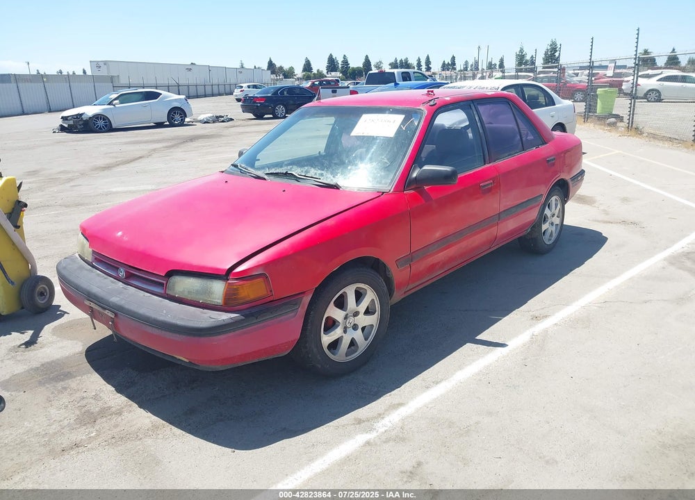 1994 MAZDA PROTEGE VIN: JM1BG2243R0737710