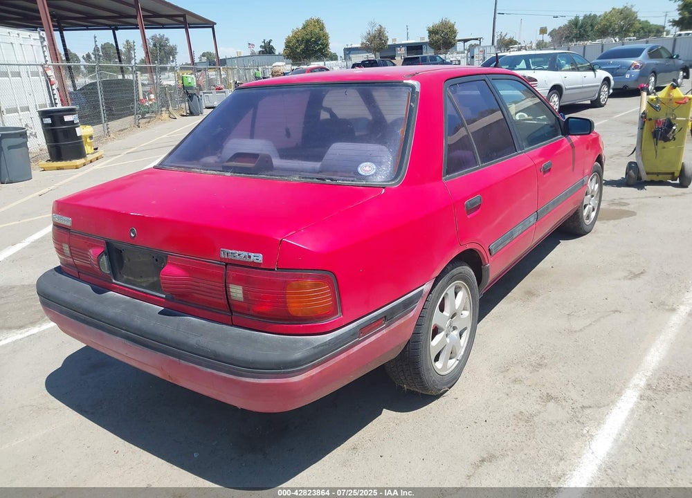 1994 MAZDA PROTEGE VIN: JM1BG2243R0737710