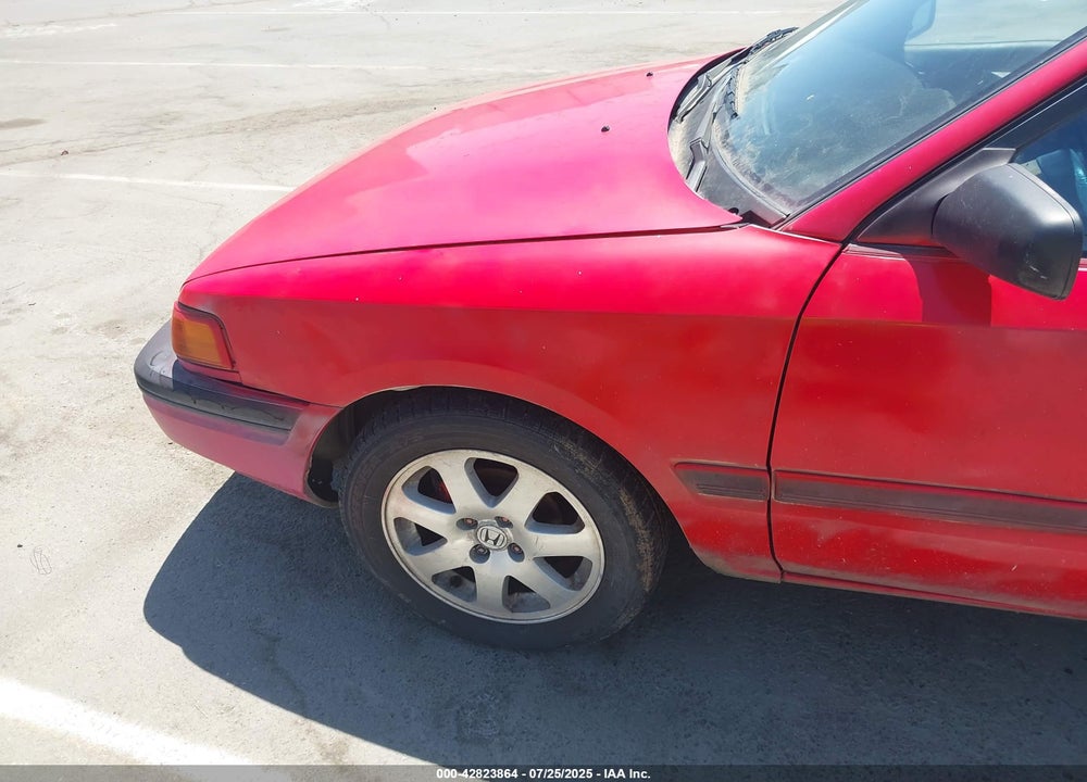 1994 MAZDA PROTEGE VIN: JM1BG2243R0737710