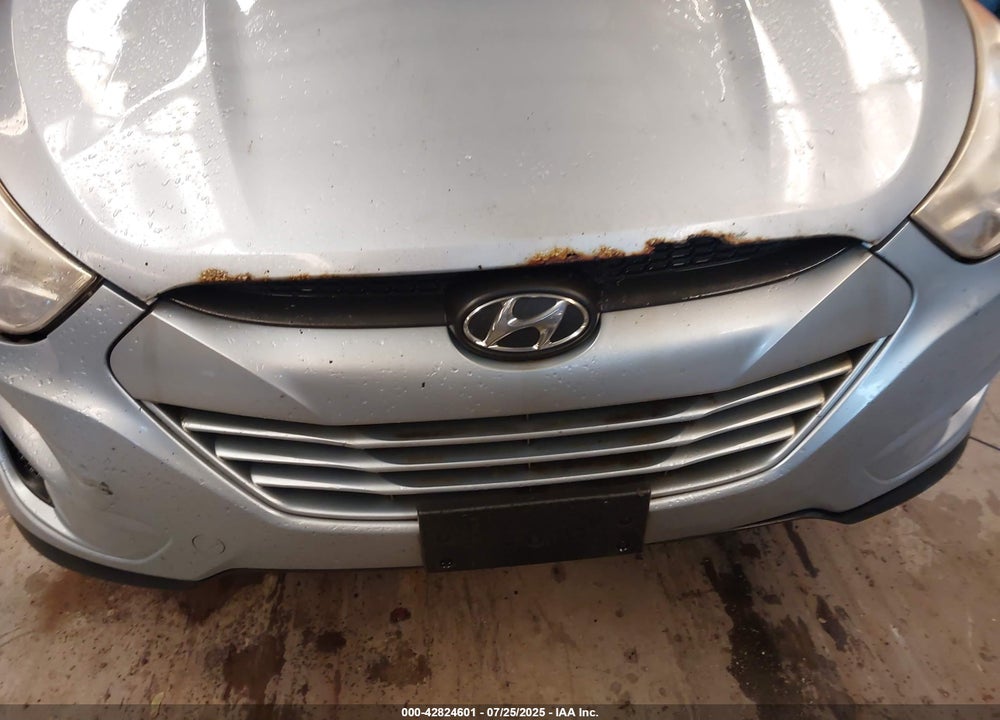 2012 HYUNDAI TUCSON VIN: KM8JUCAC5CU450996