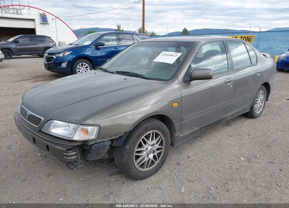 1999 INFINITI G20 STANDARD/TOURING VIN: JNKCP11A9XT000513