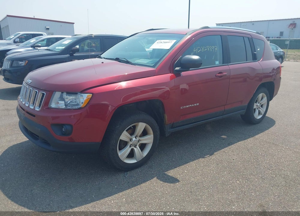 2011 JEEP COMPASS VIN: 1J4NF1FB0BD180184