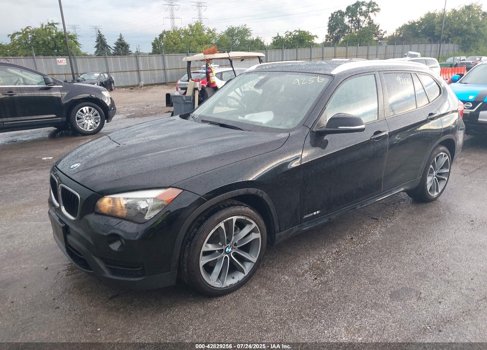 2014 BMW X1 VIN: WBAVL1C56EVY11996