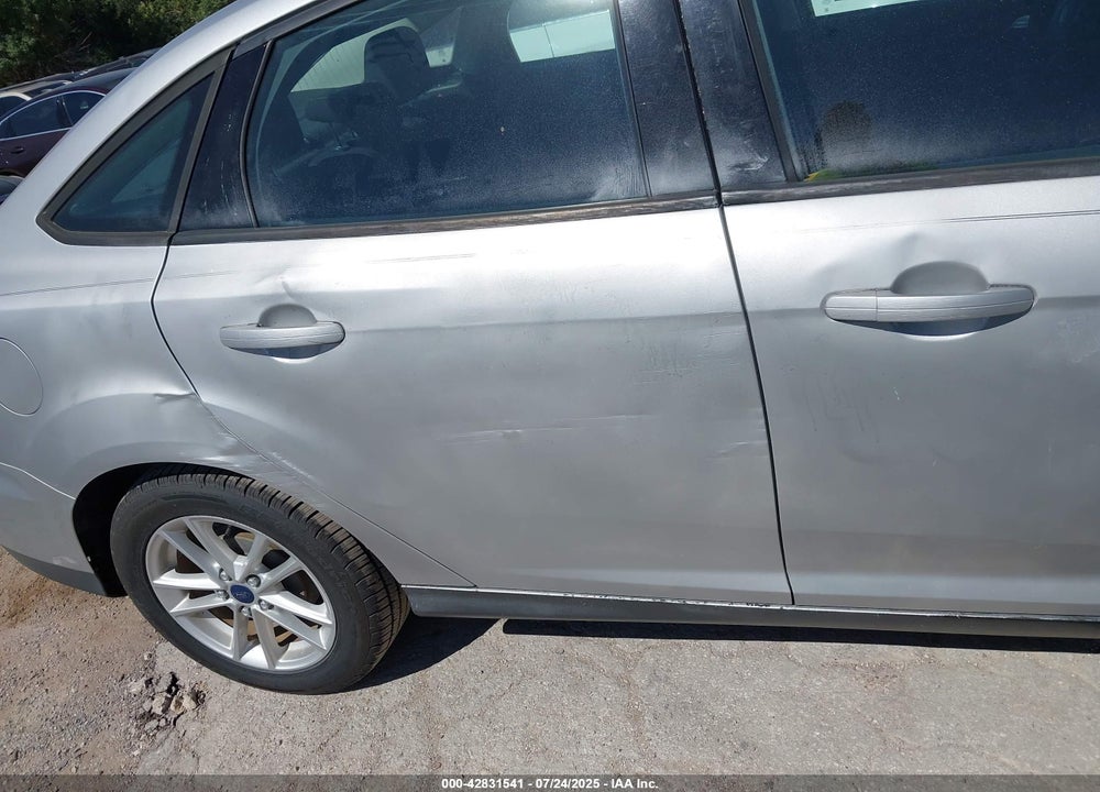 2015 FORD FOCUS VIN: 1FADP3F27FL233880