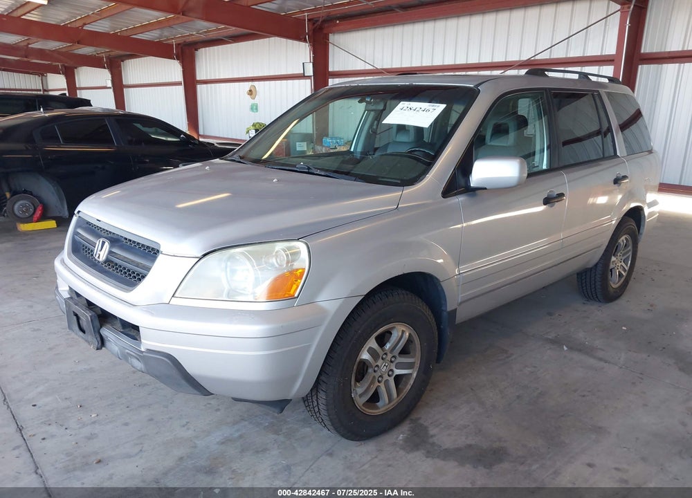 2005 HONDA PILOT EX-L VIN: 5FNYF18695B067009
