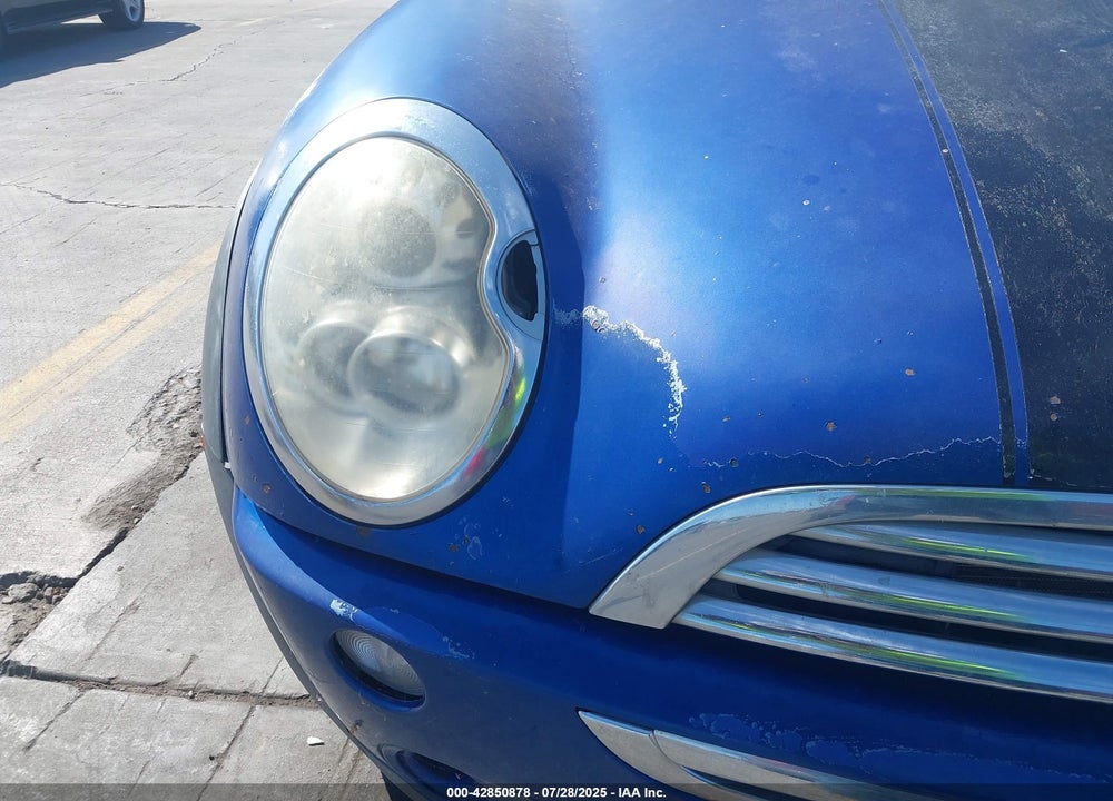 2006 MINI COOPER VIN: WMWRC33576TK94086