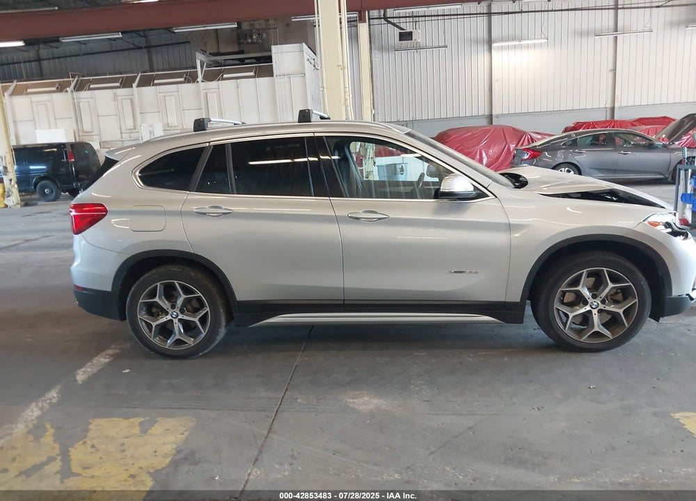 2018 BMW X1 VIN: WBXHT3C31J5K22409