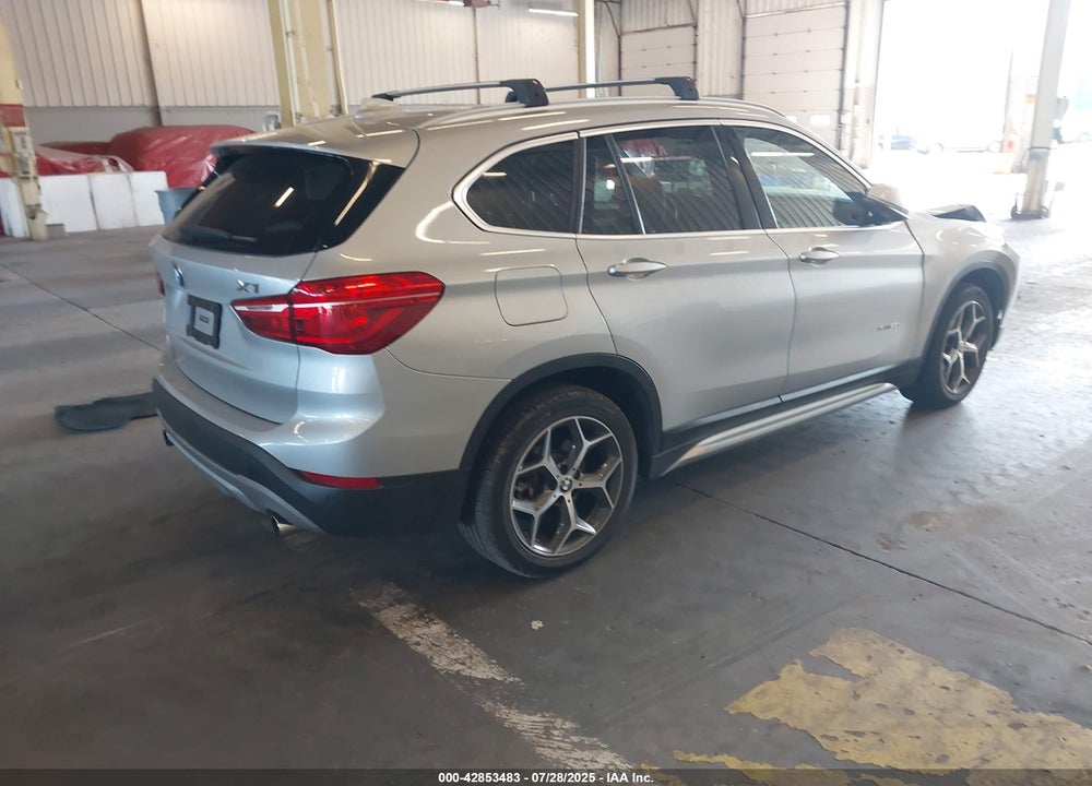 2018 BMW X1 VIN: WBXHT3C31J5K22409