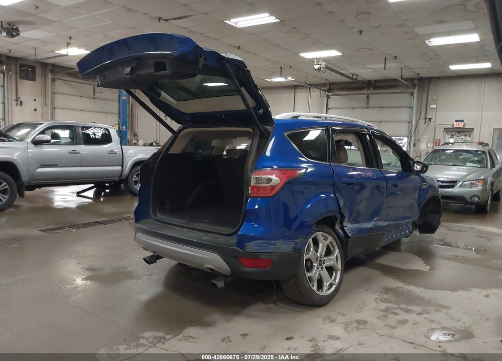 2017 FORD ESCAPE TITANIUM VIN: 1FMCU9J9XHUA97789
