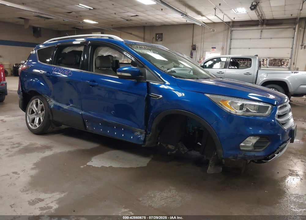2017 FORD ESCAPE TITANIUM VIN: 1FMCU9J9XHUA97789
