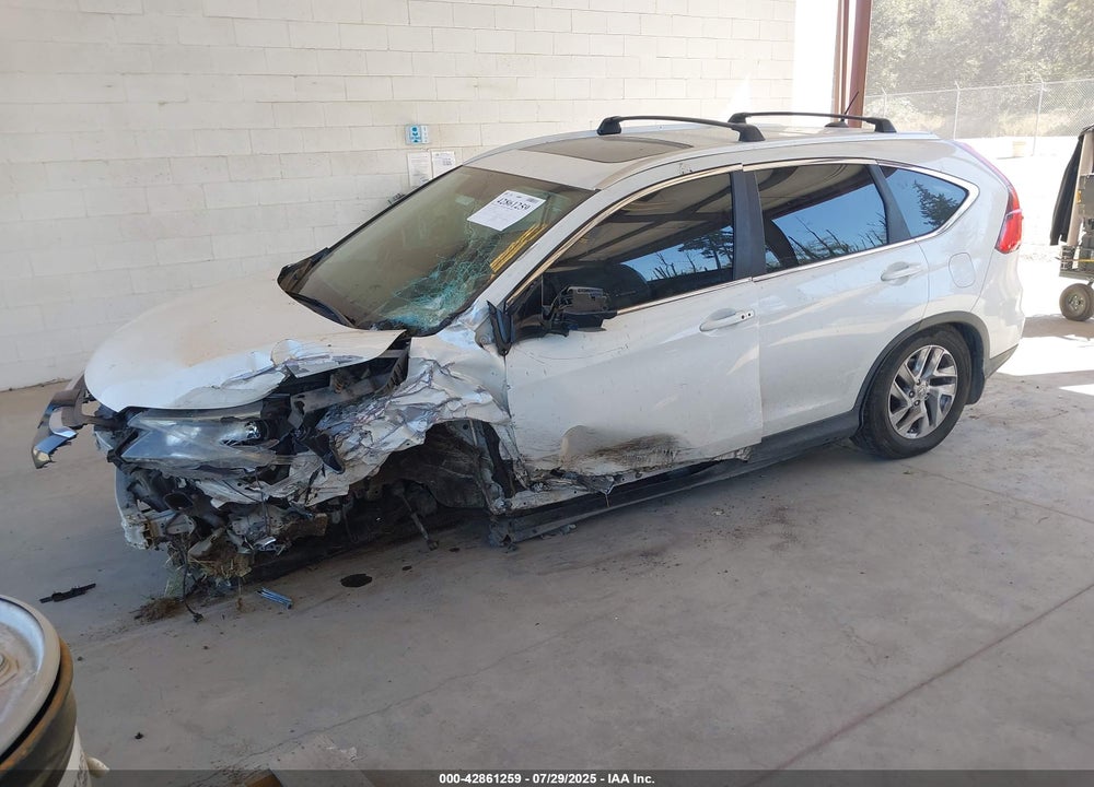 2015 HONDA CR-V VIN: 5J6RM4H79FL005610