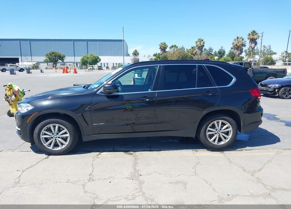 2014 BMW X5 VIN: 5UXKR2C53E0H34402