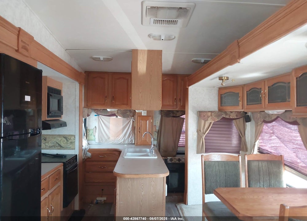 2004 KEYSTONE MONTANA 3295RK VIN: 4YDF329244D508825