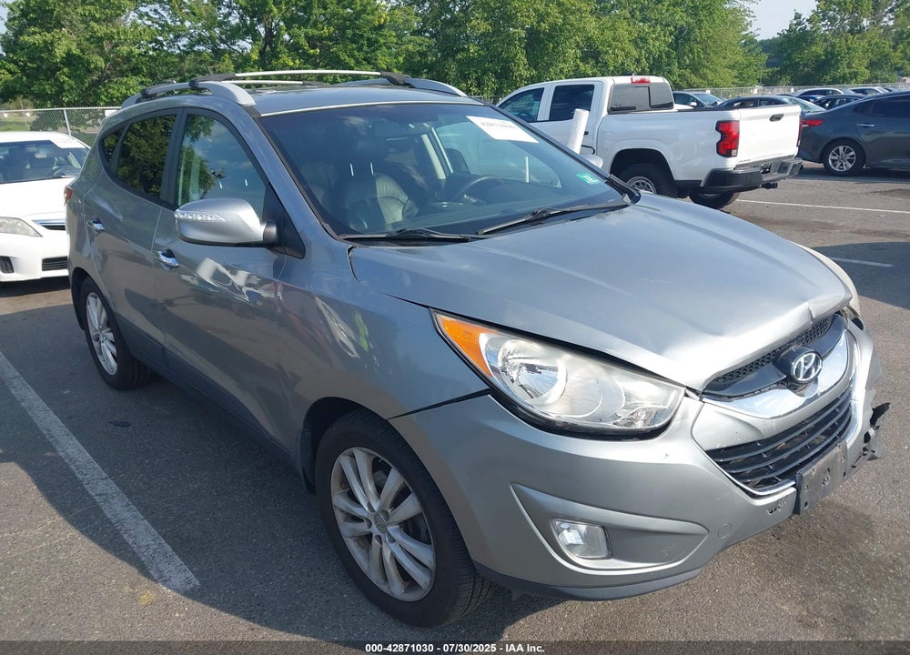 2012 HYUNDAI TUCSON LIMITED VIN: KM8JUCAC3CU381838