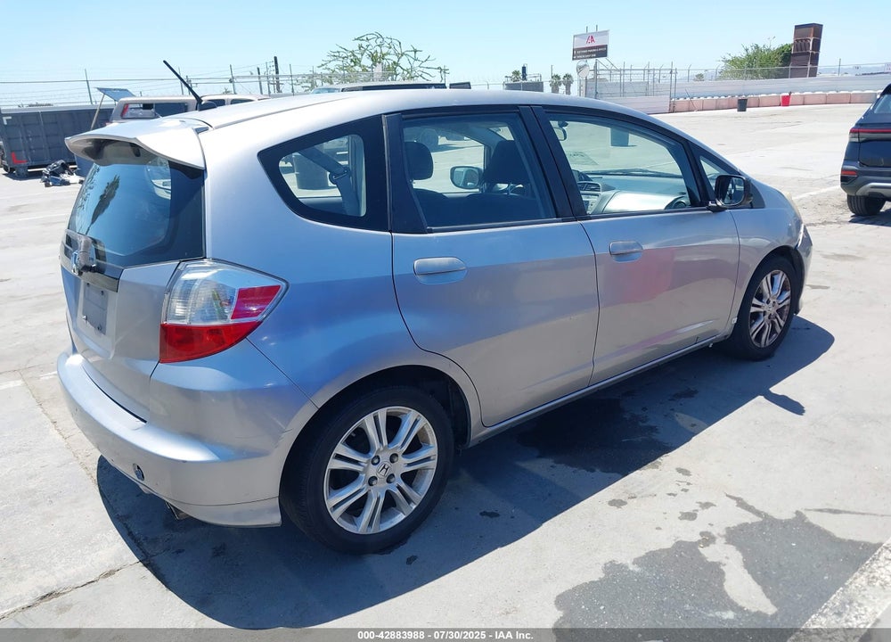 2009 HONDA FIT VIN: JHMGE88469S005659