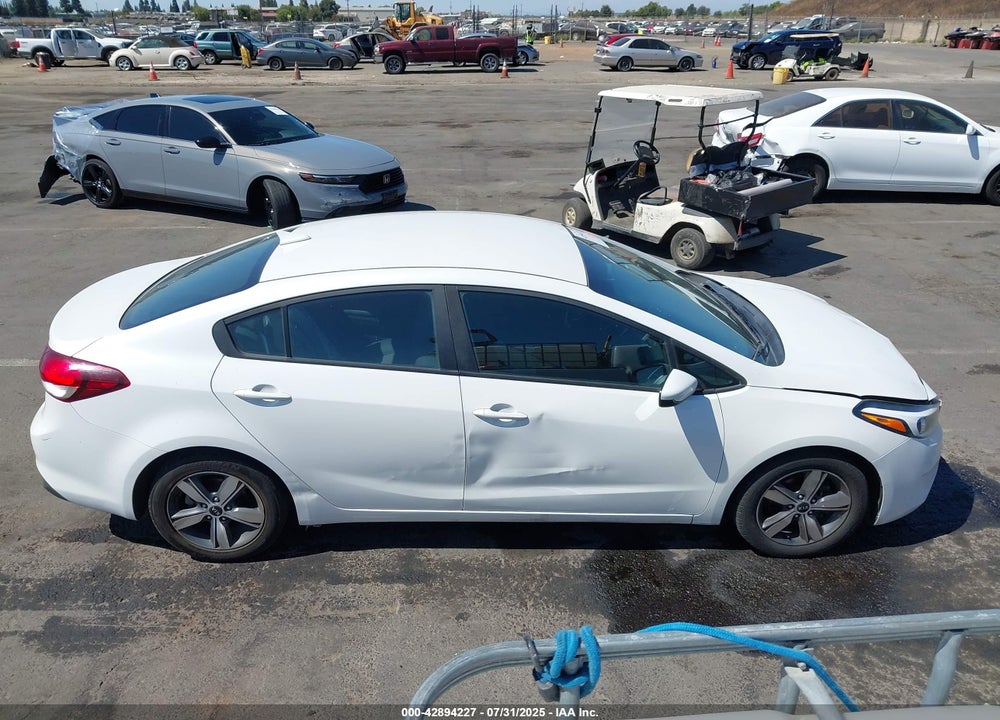 2018 KIA FORTE VIN: 3KPFL4A79JE255680