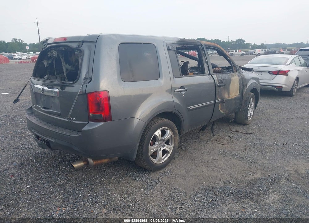 2012 HONDA PILOT EX-L VIN: 5FNYF4H75CB003704