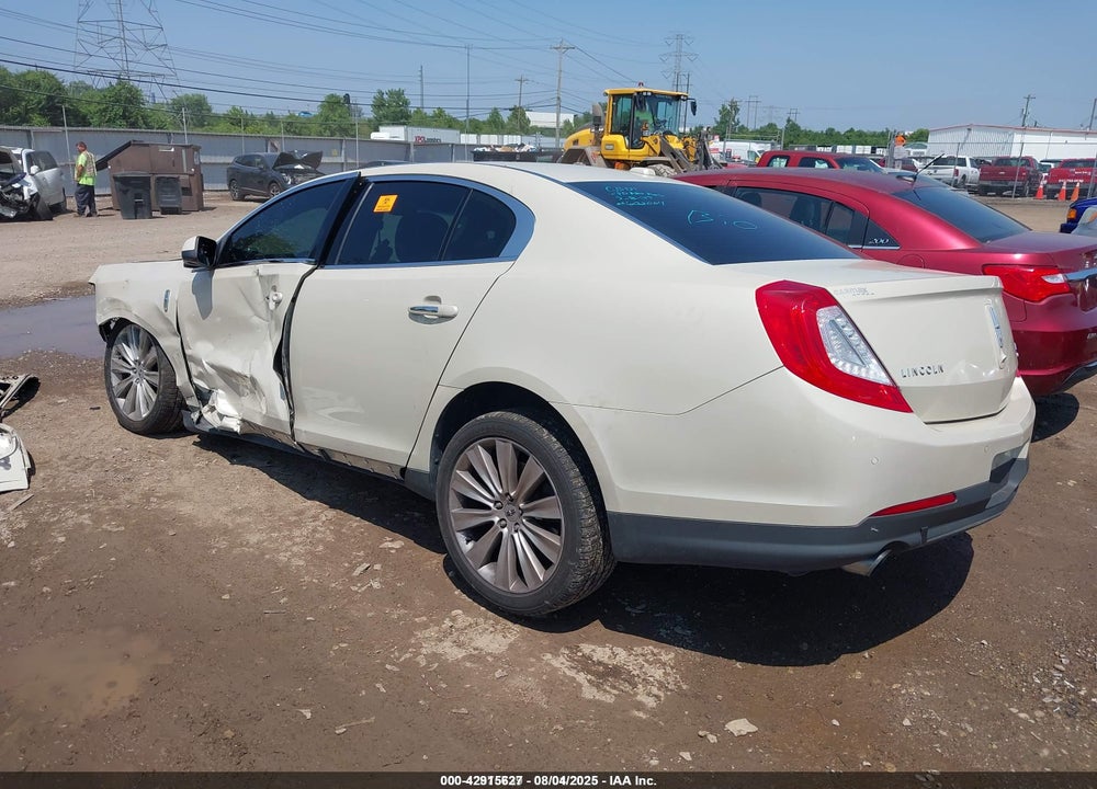 2014 LINCOLN MKS VIN: 1LNHL9FT0EG602004