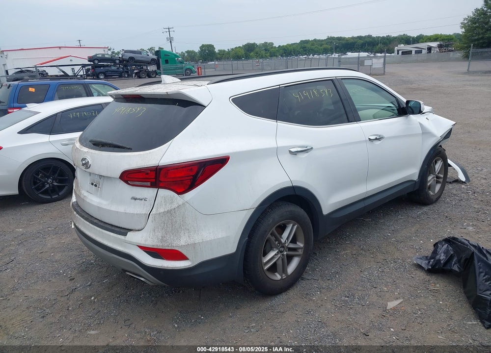 2018 HYUNDAI SANTA FE VIN: 5XYZU3LB4JG566054