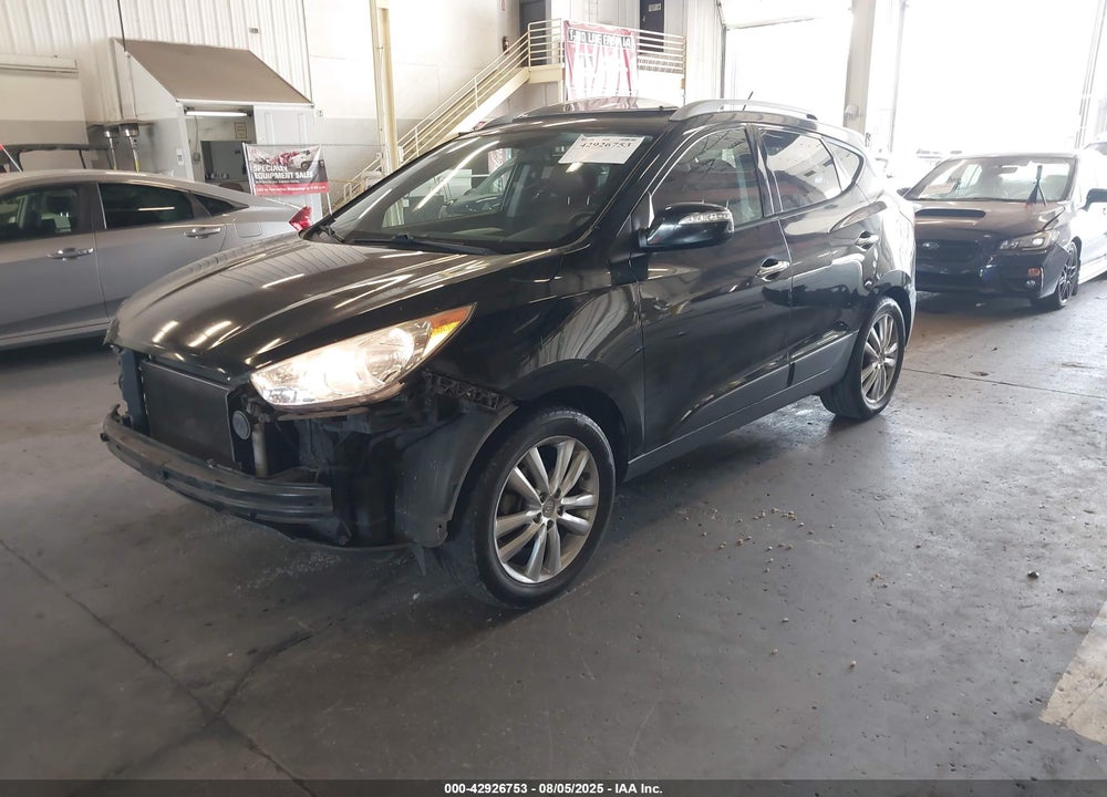 2010 HYUNDAI TUCSON VIN: KM8JUCAC7AU042013