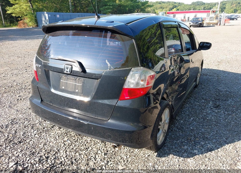2011 HONDA FIT SPORT VIN: JHMGE8H57BS002011