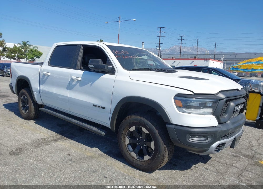 2020 RAM 1500 REBEL 4X4 5'7 BOX VIN: 1C6SRFLT5LN285591
