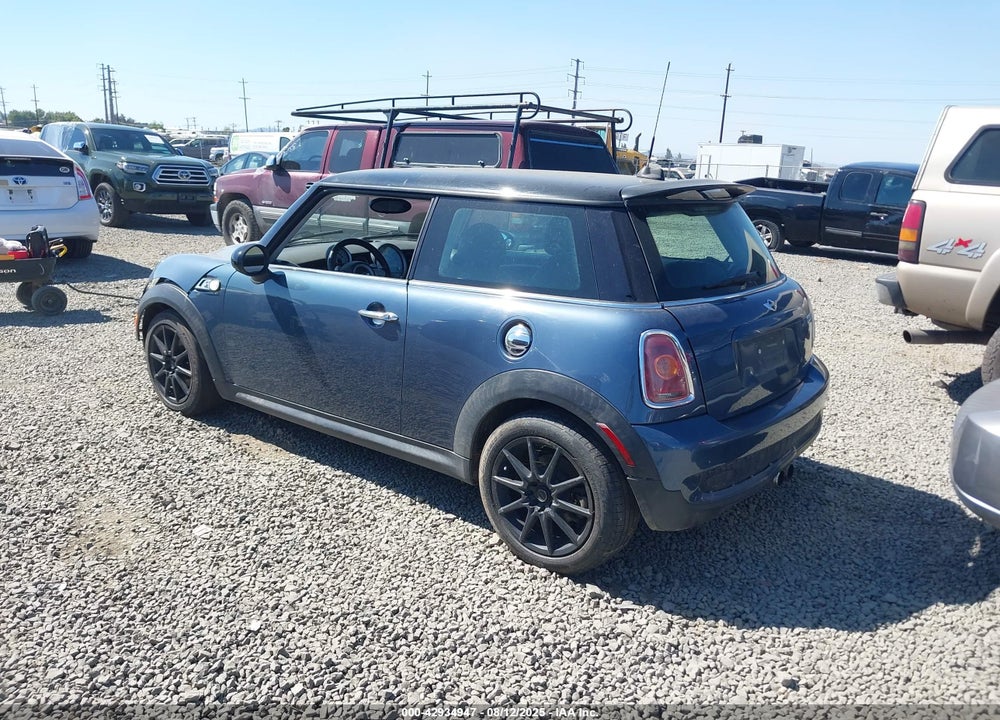 2009 MINI COOPER S VIN: WMWMF73569TW86957