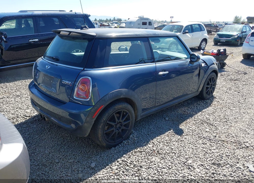 2009 MINI COOPER S VIN: WMWMF73569TW86957